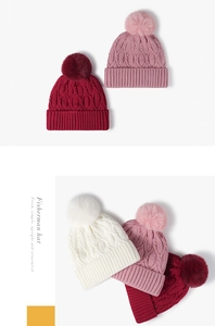 Detailed cable knit texture and faux fur pompom on thick winter beanies in multi-colors