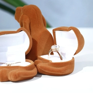 Detail view of cute brown puppy jewelry box showing flocked texture and white lining