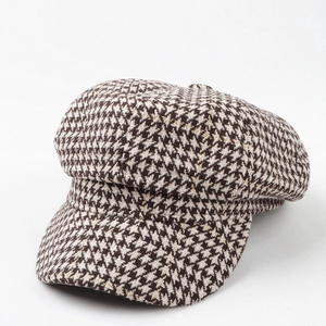 Classic houndstooth octagonal newsboy hat for women with subtle gold glitter threading