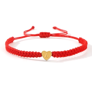 Red braided nylon rope bracelet with gold heart charm and letter A engraving