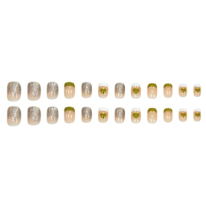 French style press-on nails set with glitter gradient and green heart pattern on white