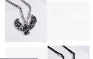 Detailed macro view of vintage eagle pendant showing intricate wing feather textures