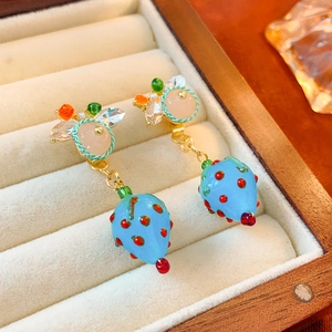 Chic handmade resin strawberry drop earrings with colorful beads in a jewelry box