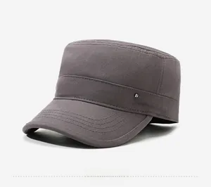 Detail of dark grey cotton cadet cap featuring metallic sports style plaque and stitching