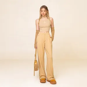 Beige American streetwear set with star vest, drawstring wide-leg pants, and chic sleeves