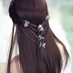 Set di 5 mollette per capelli a forma di stella marina in metallo argento con strass blu