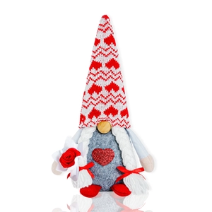 Detail of Valentines gnome with heart sequins and red rose on white background
