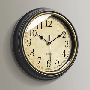 Vintage Nordic 30cm silent wall clock with black frame and gold trim in a 45-degree view