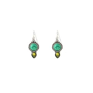 Detailed view of silver bohemian earrings with green turquoise and yellow crystal drops