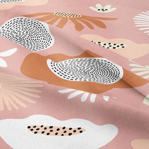 Close-up detail of Bohemian tapestry fabric showing abstract floral patterns and soft texture