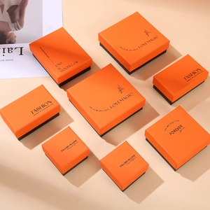 Top view of premium orange and black jewelry drawer boxes in various sizes for sets