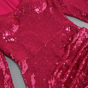Detail of rose pink sequin dress showing bodice tailoring and ostrich feather stitching