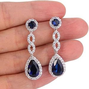 Elegant silver teardrop earrings with sapphire blue zircons and pear-shaped pendants