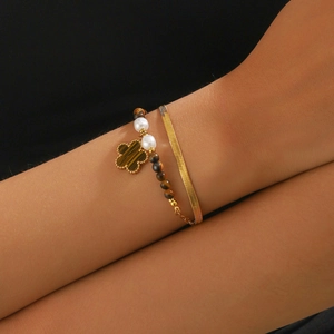 Double-layered gold stainless steel bracelet with tiger eye beads and clover pendant