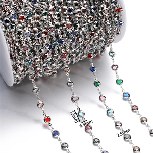 Macro detail of colorful star-shaped crystal beads with silver chain for DIY jewelry