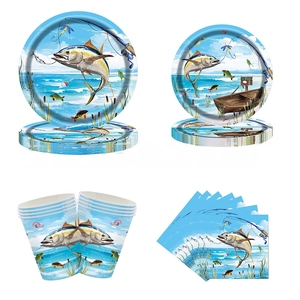 Detail of fishing themed party set featuring tuna patterns on plates cups and napkins