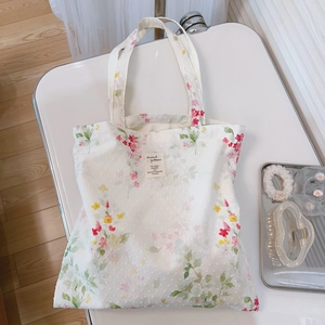 Floral cotton canvas tote bag with watercolor prints and textured polka dot fabric
