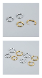 Detail showing twisted rope and hammered textures on gold and silver hoop earrings