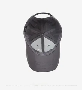 Inside view of the 100% cotton baseball cap showing interior stitching and adjustable strap