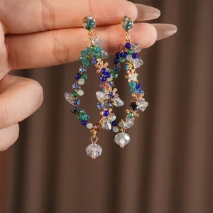 Vintage crystal fringe drop earrings with colorful beaded weaving in a luxury retro design