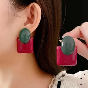 Chic resin geometric earrings with dark green oval and rose red square studs