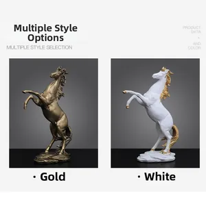 Artistic horse sculptures in gold and white finishes with dynamic galloping motion