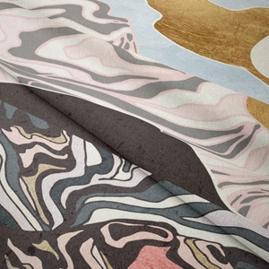 Detail shot of abstract mountain tapestry showing thick soft texture and marble patterns