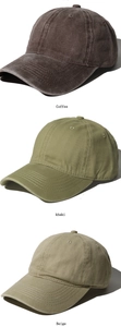 Close-up of vintage washed cotton baseball caps in coffee, khaki, and beige colors