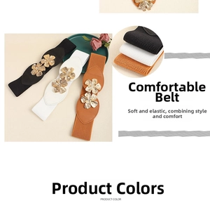 Detailed close-up of elastic waist belts in black, white and brown with floral metal buckles