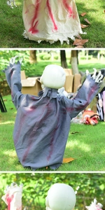 Detailed view of Halloween skeleton ghost stakes with realistic blood stains and grey rags