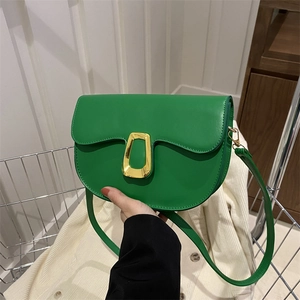 Chic green PU leather saddle bag with gold metal buckle and matching shoulder strap
