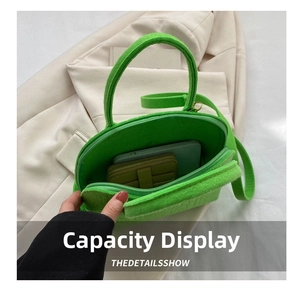 Green felt shell bag detail showing interior capacity for phone and wallet
