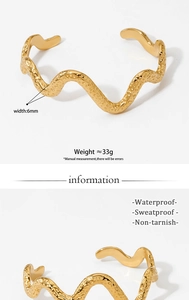 Gold wave bangle detail showing 6mm width and non-tarnish waterproof features