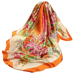 Floral satin silk square scarf with orange borders and elegant multicolored pattern