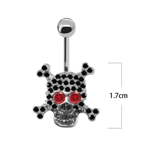 Detail showing 1.7cm skull belly button ring with black stones and red gemstone eyes
