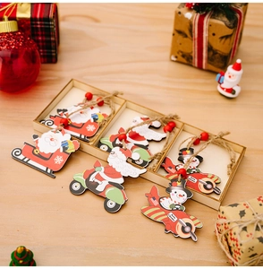 Detailed view of Christmas wooden gnome pendant set in a gift box with hanging cords