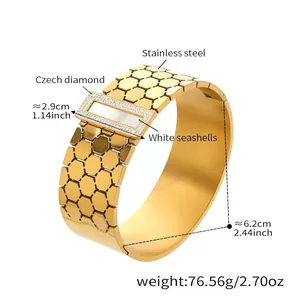 Detail of 18k gold plated honeycomb bangle with white seashells and Czech diamonds