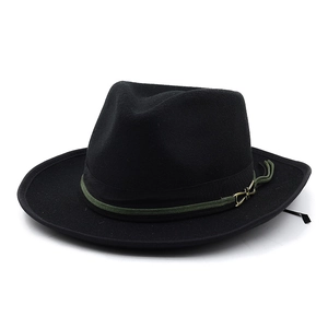Detailed macro view of black wool fedora with olive braided rope and bronze metal buckle