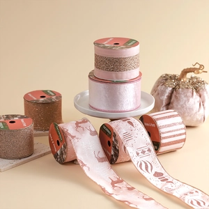 Pink and rose gold Christmas ribbon set with deer and snowflake patterns for DIY decor
