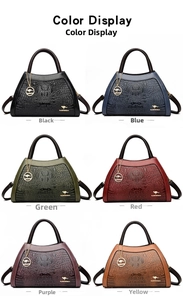 Color options of the crocodile textured women bag with kangaroo logo pendant detail