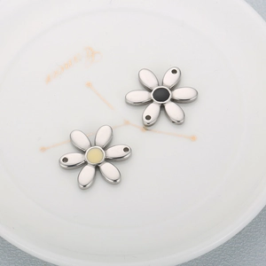 Daisy stainless steel flower pendants with two holes in black and cream enamel finishes