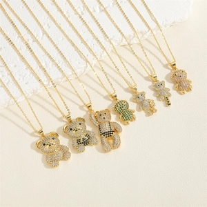 Detailed arrangement of micro-set zircon bear pendants in multiple colors with gold chains