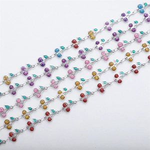 Detailed view of 18k stainless steel cherry bracelets with colorful glitter pendants