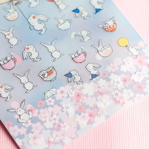 5D Rabbit nail art stickers with pink cherry blossoms and cute cartoon bunny designs