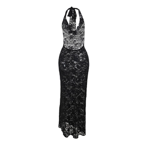 Close-up detail of the intricate floral lace embroidery on this black backless dress