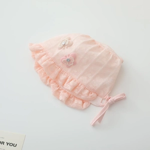 Close-up of pink lace baby sun hat with 3D butterfly embroidery and ruffle details