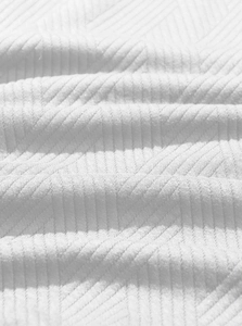 Detailed macro view of the white knitted rib texture and breathable fabric on vest