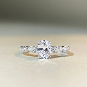 Classic 925 sterling silver 1 carat oval moissanite ring with twisted pavé band design