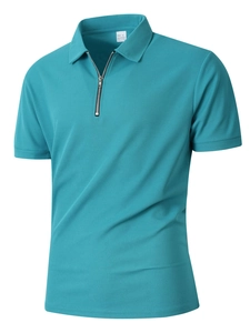 Close-up of teal men's polo shirt featuring a metal zipper and waffle knit texture fabric