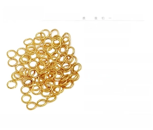 Close-up of 18K gold plated copper jump rings for DIY jewelry making accessories